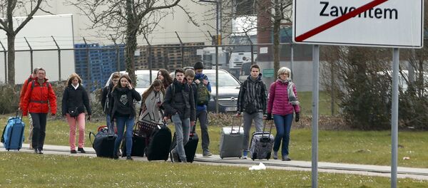 People leave the scene of explosions at Zaventem airport near Brussels, Belgium, March 22, 2016 People leave the scene of explosions at Zaventem airport near Brussels, Belgium, March 22, 2016 - Sputnik International