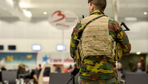 A military police soldier patrols the Brussels Airport in Zaventem, eastern Brussels - Sputnik International