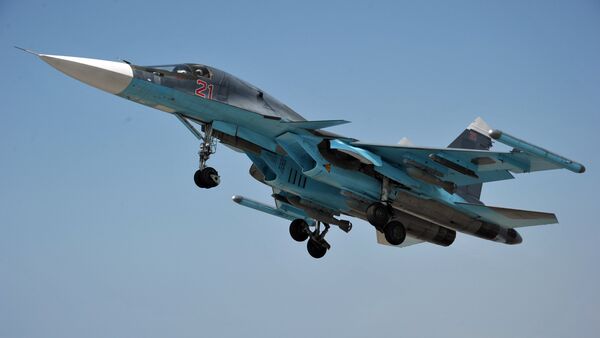 A Su-34 strike fighter  with the Khibiny ECM modules on the wing tips - Sputnik International
