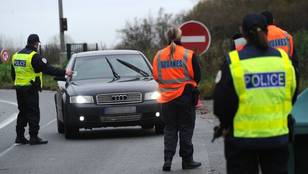 French border and customs police control vehicles at the France-Belgium border. File photo - Sputnik International
