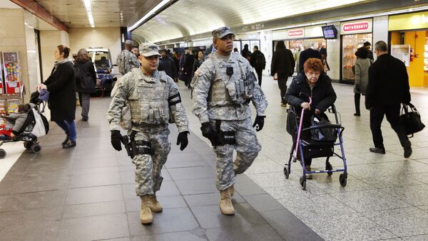 Members of the New York National Guard patrol Penn Station, Tuesday, March 22, 2016, in New York - Sputnik International