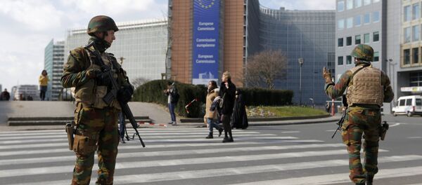 Belgian soldiers patrol outside the European Commission headquarters during high level security alert following the morning explosions in Brussels, Belgium, March 22, 2016 Belgian soldiers patrol outside the European Commission headquarters during high level security alert following the morning explosions in Brussels, Belgium, March 22, 2016 - Sputnik International