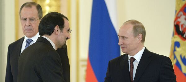 Russia's President Vladimir Putin (R) shakes hands with Iran's ambassador to Russia, Mehdi Sanai (File) Russia's President Vladimir Putin (R) shakes hands with Iran's ambassador to Russia, Mehdi Sanai (File) - Sputnik International