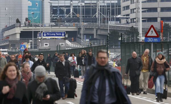 People leave the scene of explosions at Zaventem airport near Brussels, Belgium, March 22, 2016 People leave the scene of explosions at Zaventem airport near Brussels, Belgium, March 22, 2016 - Sputnik International