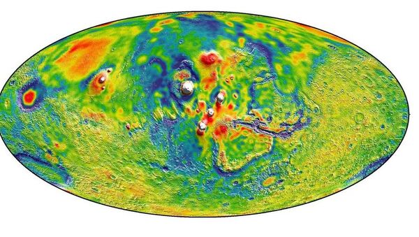 A Martian gravity map showing the Tharsis volcanoes and surrounding flexure. The white areas in the center are higher-gravity regions produced by the massive Tharsis volcanoes, and the surrounding blue areas are lower-gravity regions that may be cracks in the crust (lithosphere). - Sputnik International