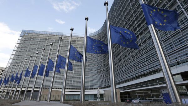 European flags fly at half-mast in front of the European Commission headquarters in tribute to victims from the morning explosions in Brussels, Belgium, March 22, 2016 - Sputnik International