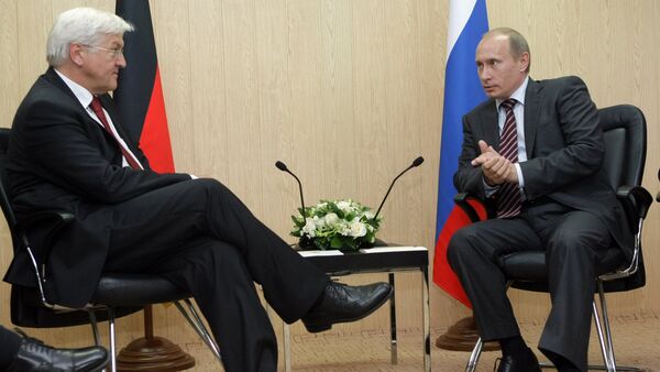 Prime Minister Vladimir Putin talks with Frank-Walter Steinmeier (File) - Sputnik International