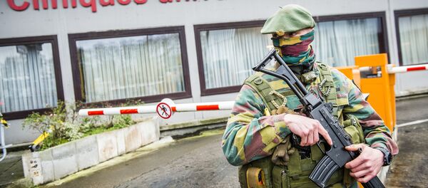 A soldier patrols in front of the hospital Cliniques Universitaires Saint-Luc in Brussels (File) A soldier patrols in front of the hospital Cliniques Universitaires Saint-Luc in Brussels (File) - Sputnik International