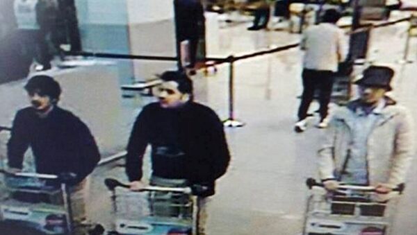 CCTV surveillance image shows three men identified as suspects in the Brussels attacks. - Sputnik International