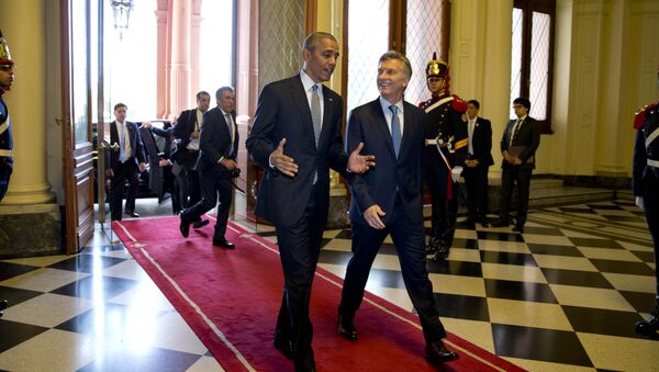 U.S. President Barack Obama and Argentina's President Mauricio Macri walk in the government house in Buenos Aires, Argentina, Wednesday, March 23, 2016 - Sputnik International