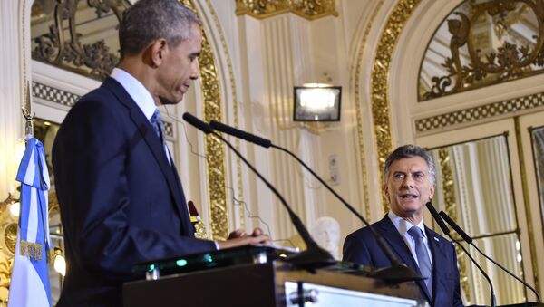 US President Barack Obama (L) and Argentinian President Mauricio Macri deliver a joint press conference at the Casa Rosada presidential palace in Buenos Aires on March 23, 2016 - Sputnik International