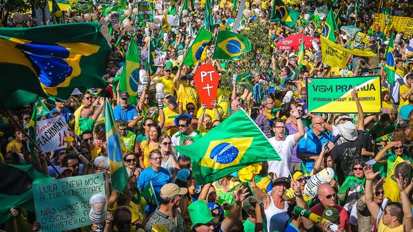 Demonstrators take part in a protest demanding the resignation of Brazilian President Dilma Rousseff, on March 13, 2016 in Porto Alegre, southern Brazil Demonstrators take part in a protest demanding the resignation of Brazilian President Dilma Rousseff, on March 13, 2016 in Porto Alegre, southern Brazil - Sputnik International