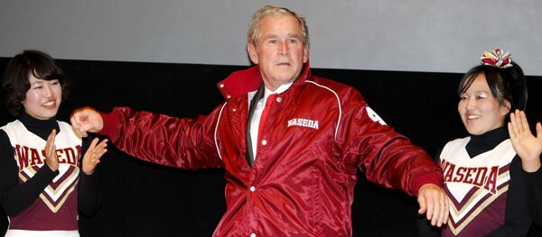 Former U.S. President George W. Bush, center, shows a pitching form, wearing a university's baseball jacket, during his visit to Waseda University in Tokyo, Japan. Former U.S. President George W. Bush, center, shows a pitching form, wearing a university's baseball jacket, during his visit to Waseda University in Tokyo, Japan. - Sputnik International