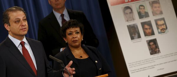 Manhattan U.S. Attorney Preet Bharara (L-R), Federal Bureau of Investigation Director James Comey and U.S. Attorney General Loretta Lynch hold a news conference to announce indictments on Iranian hackers for a coordinated campaign of cyber attacks in 2012 and 2013 on several U.S. banks and a New York dam, at the Justice Department in Washington March 24, 2016 - Sputnik International