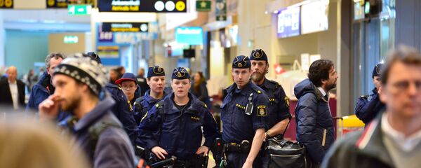 Swedish policemen patrol the Arlanda airport outside Stockholm, Sweden March 22, 2016. Swedish policemen patrol the Arlanda airport outside Stockholm, Sweden March 22, 2016. - Sputnik International