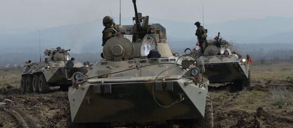 BTR-82A armored vehicles during the battalion tactical field firing exercise of the motorized infantry brigade of the Southern Military District at the Gvardeyets base in Shali district, Chechnya. - Sputnik International