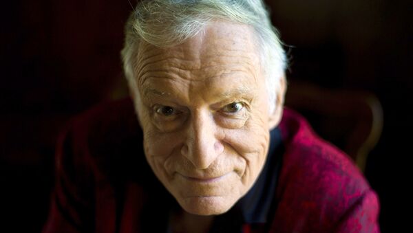 In this Oct. 13, 2011 photo, American magazine publisher, founder and Chief Creative Officer of Playboy Enterprises, Hugh Hefner at his home at the Playboy Mansion in Beverly Hills, Calif. - Sputnik International