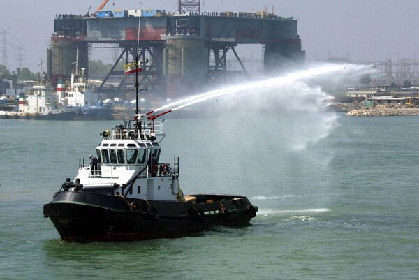 A barge sprays water during the opening of the Neka oil terminal on the Caspian Sea, 340 kms northwest of Tehran in Mazandaran province (file) A barge sprays water during the opening of the Neka oil terminal on the Caspian Sea, 340 kms northwest of Tehran in Mazandaran province (file) - Sputnik International
