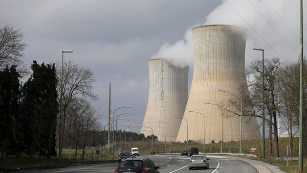 Steam escapes from the cooling tower of the Tihange nuclear power station, one of the two large-scale nuclear power plants in Belgium, March 26, 2016. - Sputnik International