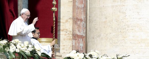 Pope Francis delivers the Urbi et Orbi benediction at the end of the Easter Mass in Saint Peter's Square at the Vatican Pope Francis delivers the Urbi et Orbi benediction at the end of the Easter Mass in Saint Peter's Square at the Vatican - Sputnik International
