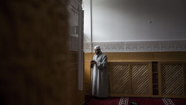 A man during the official opening of Denmark's first mosque with a dome and minaret in Rovsingsgade, Copenhagen - Sputnik International
