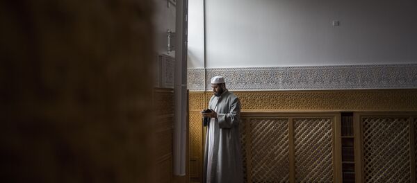 A man during the official opening of Denmark's first mosque with a dome and minaret in Rovsingsgade, Copenhagen A man during the official opening of Denmark's first mosque with a dome and minaret in Rovsingsgade, Copenhagen - Sputnik International