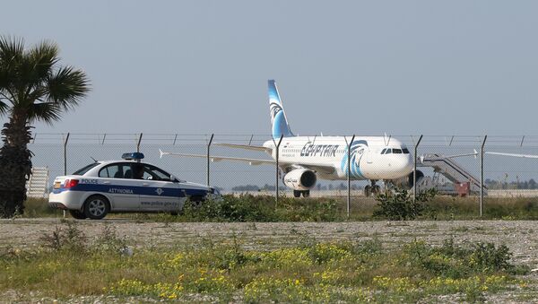 An EgyptAir Airbus A-320 sits on the tarmac of Larnaca airport after it was hijacked and diverted to Cyprus on March 29, 2016 - Sputnik International