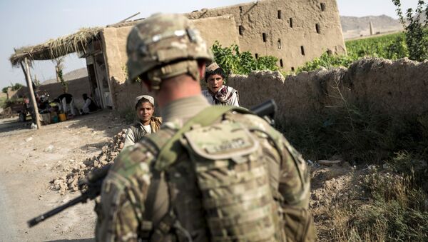A US soldier patrols near Kandahar Airfield. file photo - Sputnik International