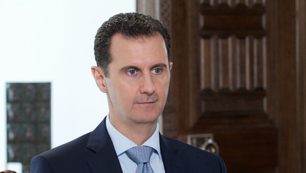 Syrian President Bashar al-Assad during an interview with Rossiya Segodnya Director General Dmitry Kiselev - Sputnik International