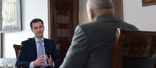 Syrian President Bashar al-Assad's interview with Rossiya Segodnya Director General Dmitry Kiselev Syrian President Bashar al-Assad's interview with Rossiya Segodnya Director General Dmitry Kiselev - Sputnik International