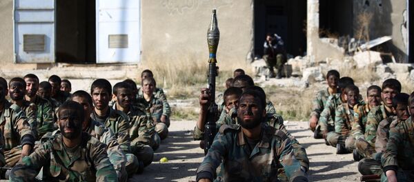 Syrian youths take part in their last training on December 8, 2014 before being sent to the frontline along with rebel fighters from the Jaysh al-Islam brigades (Army of Islam) in Eastern al-Ghouta, a rebel-held region outside the capital Damascus - Sputnik International