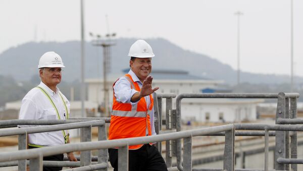 Panama's president Juan Carlos Varela gestures during his visit to the new set of locks at the Panama Canal Expansion project on the pacific side in Panama City March 18, 2016 - Sputnik International