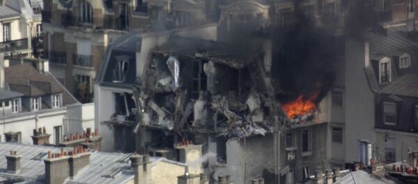 Flames erupt from an appartment building following an explosion that occured in rue de Berite on April 1, 2016 in Paris Flames erupt from an appartment building following an explosion that occured in rue de Berite on April 1, 2016 in Paris - Sputnik International