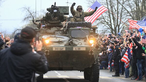 US military convoy, including IAV Strykers, arrives to the Czech army barracks on March 30, 2015 in Prague after entering the Czech Republic at the border crossing in Harrachov on the way from Baltic countries to base in Vilseck, southern Germany - Sputnik International