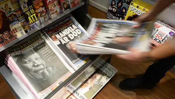 Swedish newspapers with frontpages depicting South Africa's anti-apartheid icon Nelson Mandela - Sputnik International
