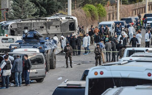 Turkish special force police officers walk at the site of a bomb attack in Diyarbakir, southeastern Turkey, on March 31, 2016 Turkish special force police officers walk at the site of a bomb attack in Diyarbakir, southeastern Turkey, on March 31, 2016 - Sputnik International