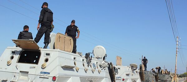 Egyptian security forces stand by their Armoured Personell Carriers ahead of a military operation in the northern Sinai peninsula (File) - Sputnik International