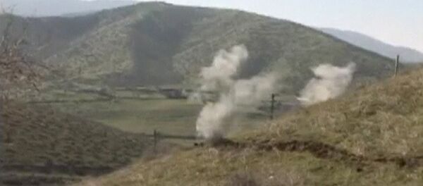 Smoke rises after clashes between Armenian and Azeri forces in Nagorno-Karabakh region in this still image taken from video provided by the Nagorno-Karabakh region Defence Ministry April 2, 2016. - Sputnik International
