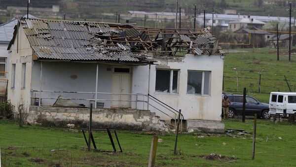 A damaged house in a village of the Martakert district, in the Nagorno-Karabakh conflict zone. - Sputnik International
