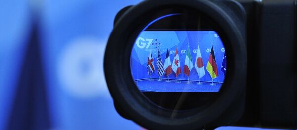 Flags are seen in a camera screen at the G7 summit (file) - Sputnik International