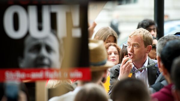 Liberal Democrat MP Tim Farron takes part in a human rights protest in central London on May 30, 2015 to demonstrate against the Conservative government's proposal to scrap the Human Rights Act. - Sputnik International