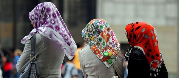Three women of Turkish origin wearing colourful headscarves Three women of Turkish origin wearing colourful headscarves - Sputnik International
