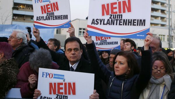 Protesters hold up banners reading No refugee home during a demonstration by the Austrian Freedom Party (FPOe) in Vienna, Austria, March 14, 2016. - Sputnik International