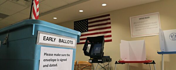 An example of an early ballot collection box and demonstration of voting areas is set up at the Maricopa County Recorder’s office in Phoenix. An example of an early ballot collection box and demonstration of voting areas is set up at the Maricopa County Recorder’s office in Phoenix. - Sputnik International