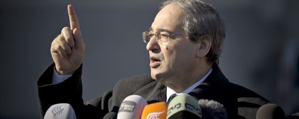 Syrian Deputy Foreign Minister Faisal Mekdad gestures as he talks to journalists after a meeting with the Syrian opposition at the United Nations headquarters in Geneva, Switzerland (File) - Sputnik International