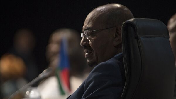 Sudanese President Omar al-Bashir attends the opening session of the AU summit in Johannesburg, Sunday, June 14, 2015 - Sputnik International