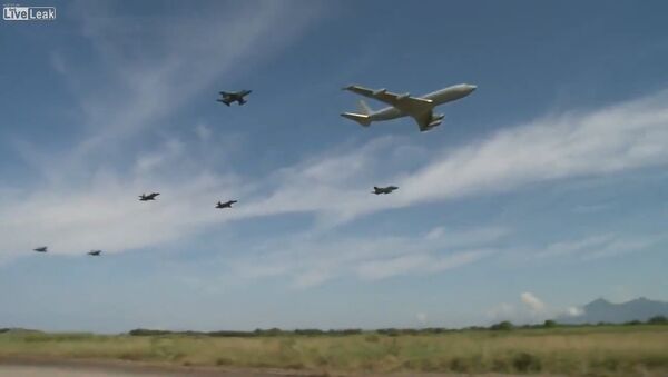 Brazilian air force jets escorting cargo plane, low fly - Sputnik International