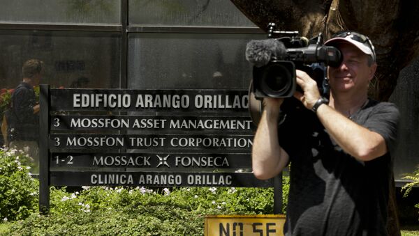 A cameraman films outside the Arango Orillac Building that lists the Mossack Fonseca law firm in Panama City, Tuesday, April 5, 2016 - Sputnik International