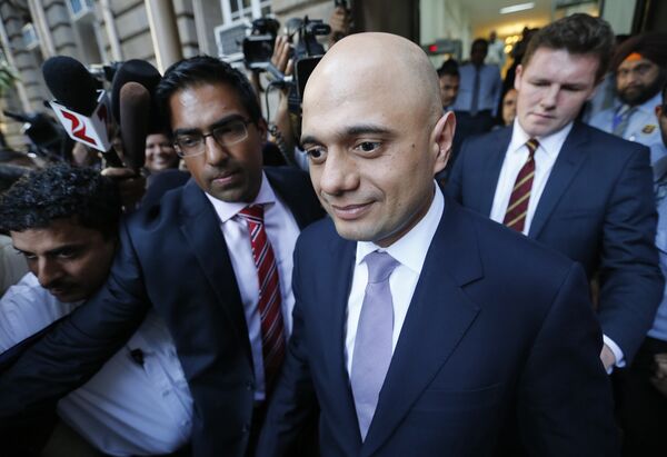 Britain's Business Secretary Sajid Javid leaves Bombay House, Tata Group head office in Mumbai, India, April 6, 2016. Britain's Business Secretary Sajid Javid leaves Bombay House, Tata Group head office in Mumbai, India, April 6, 2016. - Sputnik International