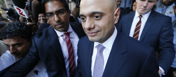 Britain's Business Secretary Sajid Javid leaves Bombay House, Tata Group head office in Mumbai, India, April 6, 2016. - Sputnik International